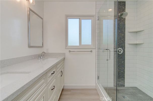 Bathroom, Dual Sink Vanities, Glass Shower, Interior, Wood Texture Flooring