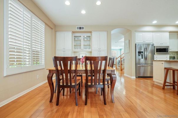 Dining room, Interior, Kitchen, Recessed Lighting, Stainless Steel Appliances, Wood Texture Flooring