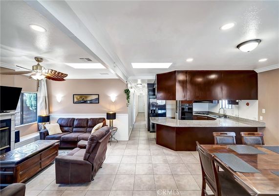 Fireplace, Interior, Kitchen, Living room, Recessed Lighting, Stainless Steel Appliances