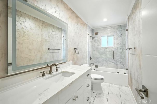 Bathroom, Dual Sink Vanities, Interior, Marble, Marble Walls, Recessed Lighting