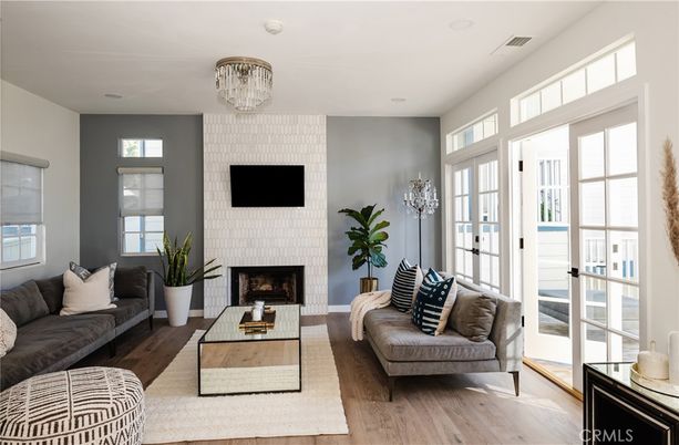 Chandelier, Fireplace, Interior, Living room, Recessed Lighting, Wood Texture Flooring