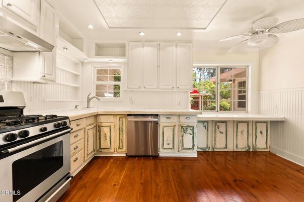 Interior, Kitchen, Stainless Steel Appliances, Tile Countertops, Wood Texture Flooring
