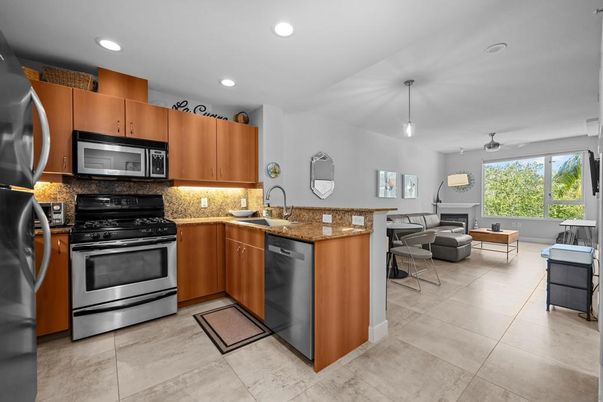 Dining room, Fireplace, Interior, Kitchen, Living room, Pendant Lights, Recessed Lighting, Stainless Steel Appliances