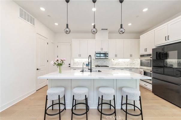 Interior, Kitchen, Pendant Lights, Recessed Lighting, Stainless Steel Appliances, Wood Texture Flooring