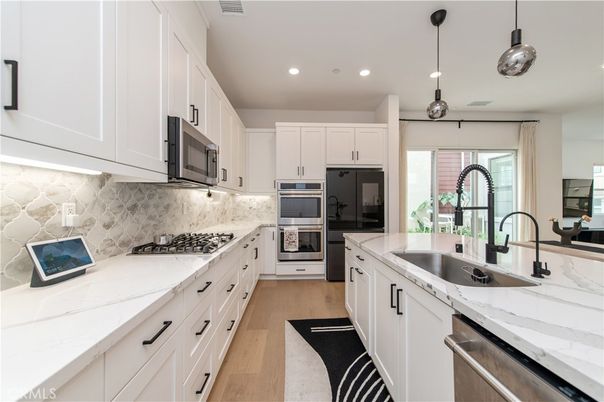 Interior, Kitchen, Pendant Lights, Recessed Lighting, Stainless Steel Appliances, Wood Texture Flooring