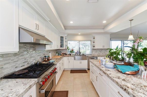 Interior, Kitchen, Pendant Lights, Recessed Lighting, Stainless Steel Appliances, Stone Walls