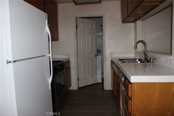 Interior, Kitchen, Tile Countertops, Wood Texture Flooring