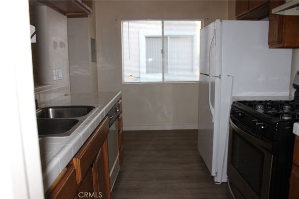 Interior, Kitchen, Tile Countertops, Wood Texture Flooring