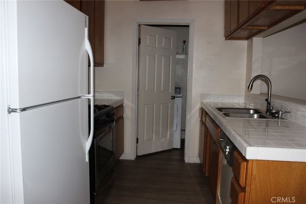 Interior, Kitchen, Tile Countertops, Wood Texture Flooring