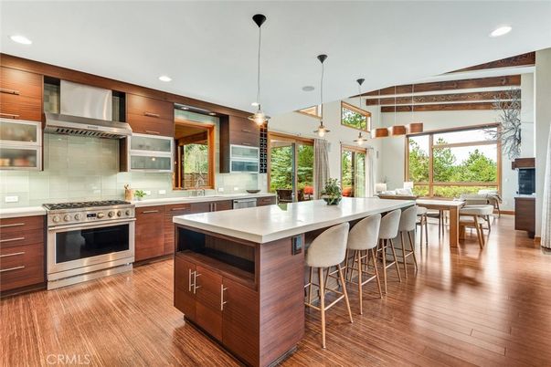 Dining room, Interior, Kitchen, Pendant Lights, Recessed Lighting, Stainless Steel Appliances, Wooden Beams, Wood Texture Flooring