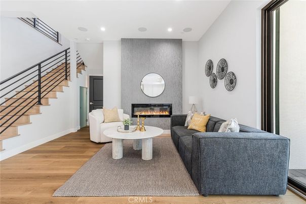 Fireplace, Interior, Living room, Recessed Lighting, Wood Texture Flooring