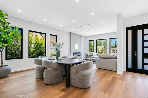 Dining room, Fireplace, Interior, Living room, Recessed Lighting, Wood Texture Flooring