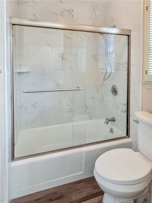 Bathroom, Glass Shower, Interior, Marble Walls, Wood Texture Flooring