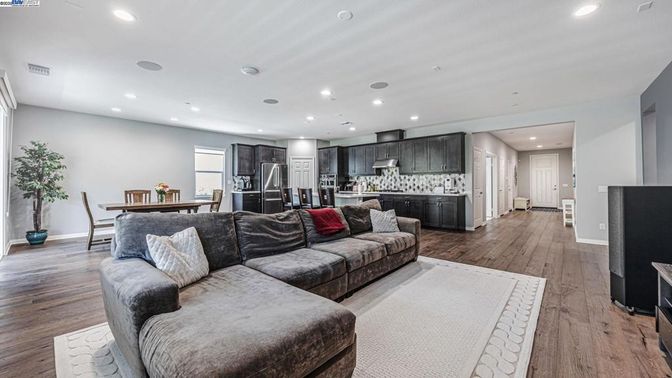 Dining room, Interior, Kitchen, Living room, Recessed Lighting, Stainless Steel Appliances, Wood Texture Flooring