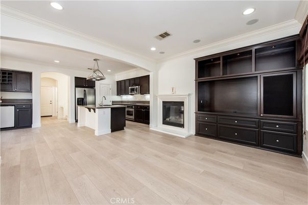 Fireplace, Interior, Kitchen, Pendant Lights, Recessed Lighting, Stainless Steel Appliances, Wood Texture Flooring