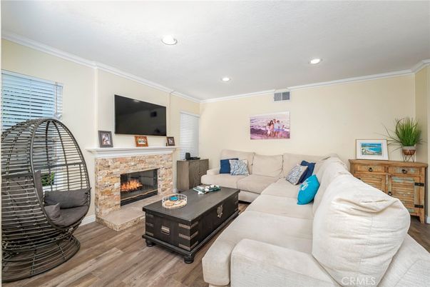 Fireplace, Interior, Living room, Recessed Lighting, Wood Texture Flooring