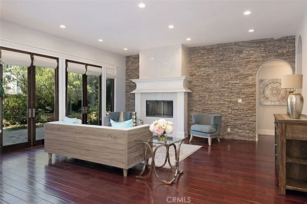 Fireplace, Interior, Living room, Recessed Lighting, Stone Walls, Wood Texture Flooring