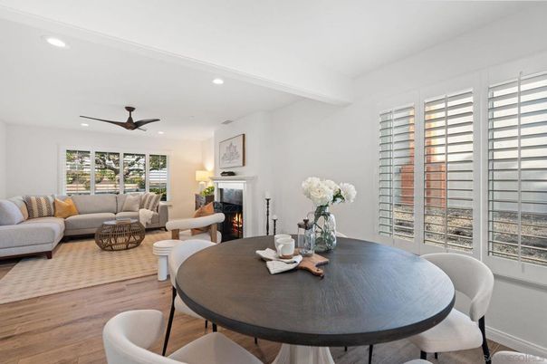 Dining room, Fireplace, Interior, Living room, Recessed Lighting, Wood Texture Flooring