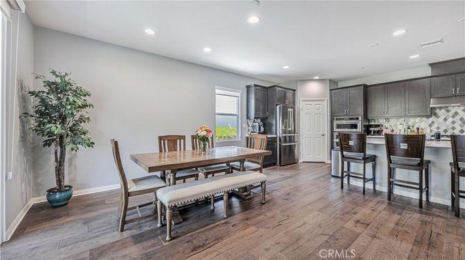 Dining room, Interior, Kitchen, Recessed Lighting, Stainless Steel Appliances, Wood Texture Flooring