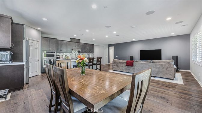 Dining room, Interior, Kitchen, Living room, Recessed Lighting, Stainless Steel Appliances, Wood Texture Flooring