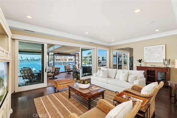 Fireplace, Interior, Living room, Recessed Lighting, Water, Wood Texture Flooring