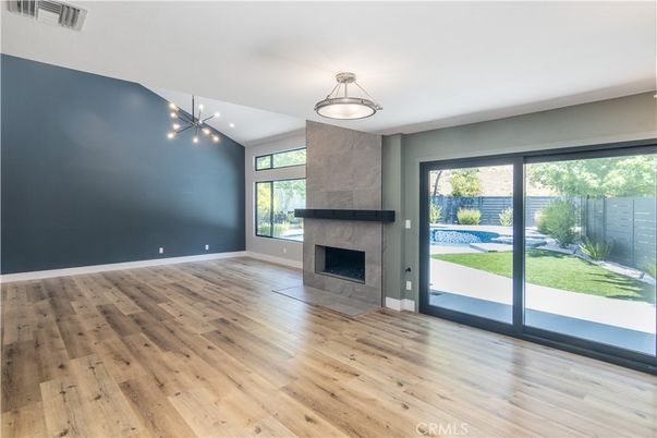 Empty room, Fireplace, Interior, Pendant Lights, Wood Texture Flooring