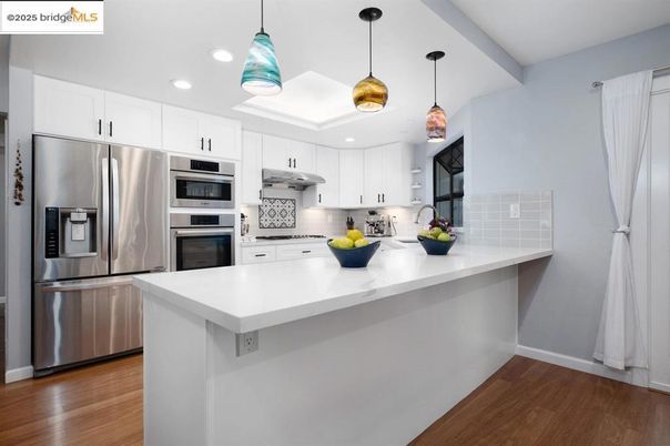 Interior, Kitchen, Pendant Lights, Recessed Lighting, Stainless Steel Appliances, Wood Texture Flooring