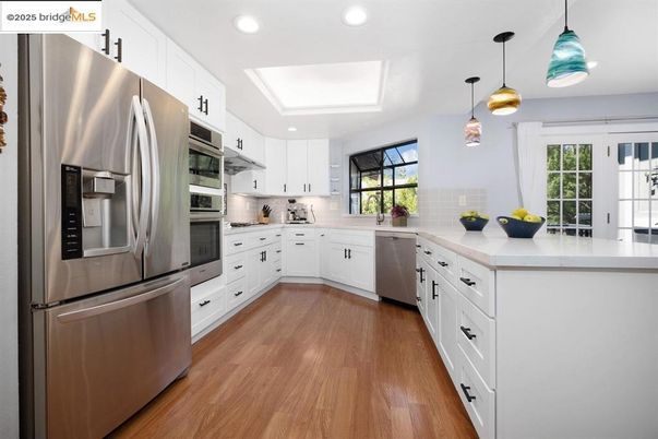 Interior, Kitchen, Pendant Lights, Recessed Lighting, Stainless Steel Appliances, Wood Texture Flooring