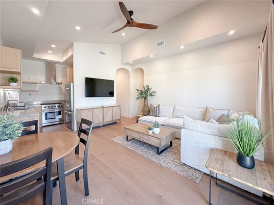 Dining room, Interior, Kitchen, Living room, Recessed Lighting, Stainless Steel Appliances, Wood Texture Flooring