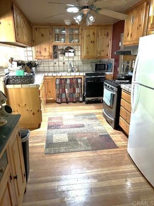 Interior, Kitchen, Tile Countertops, Wood Texture Flooring