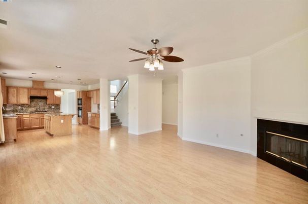 Empty room, Fireplace, Interior, Kitchen, Pendant Lights, Recessed Lighting, Wood Texture Flooring