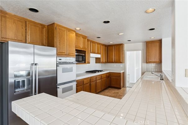 Interior, Kitchen, Recessed Lighting, Tile Countertops