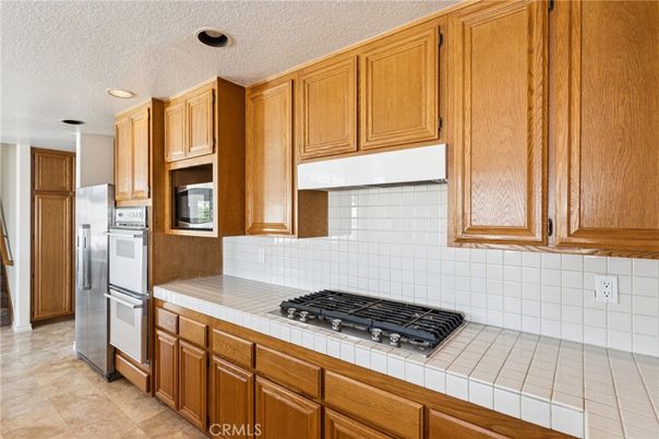 Interior, Kitchen, Recessed Lighting, Tile Countertops