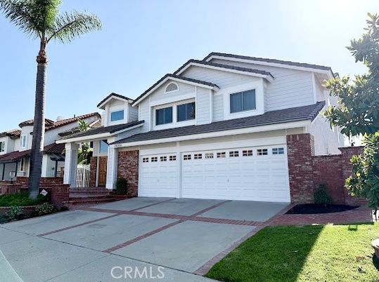 Attached, Exterior, Facade, Brick Facade, American Craftsman