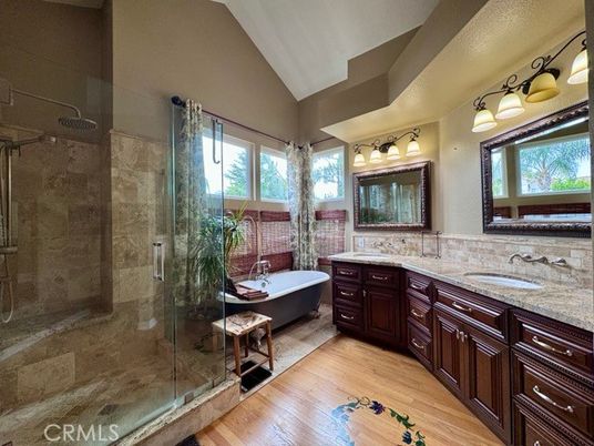 Bathroom, Dual Sink Vanities, Free Standing Baths, Glass Shower, Interior, Wood Texture Flooring