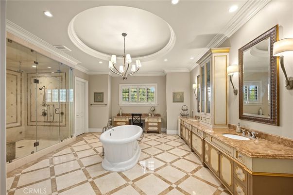 Bathroom, Chandelier, Dual Sink Vanities, Free Standing Baths, Glass Shower, Interior, Pendant Lights, Recessed Lighting