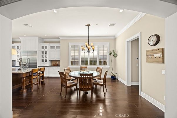 Chandelier, Dining room, Interior, Kitchen, Recessed Lighting, Stainless Steel Appliances, Wood Texture Flooring