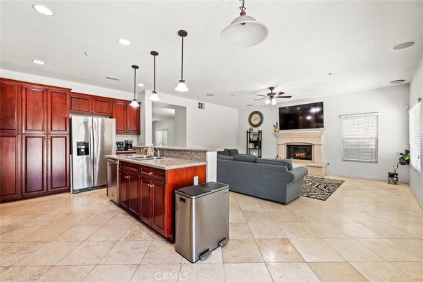 Fireplace, Interior, Kitchen, Living room, Pendant Lights, Recessed Lighting, Stainless Steel Appliances