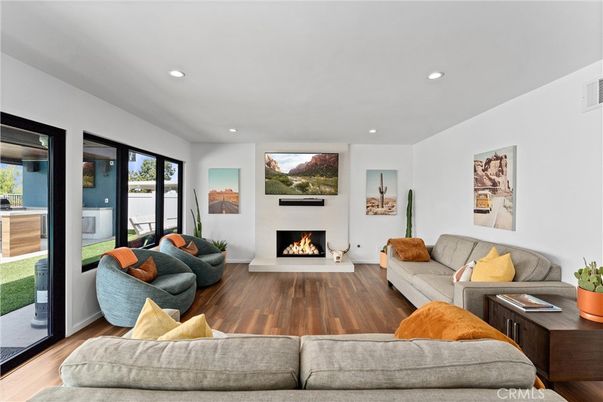 Fireplace, Interior, Living room, Recessed Lighting, Wood Texture Flooring