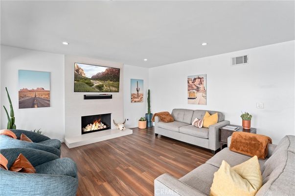 Fireplace, Interior, Living room, Recessed Lighting, Wood Texture Flooring