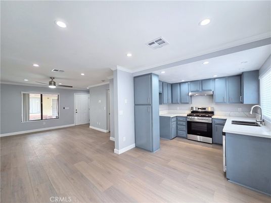 Interior, Kitchen, Recessed Lighting, Stainless Steel Appliances, Wood Texture Flooring