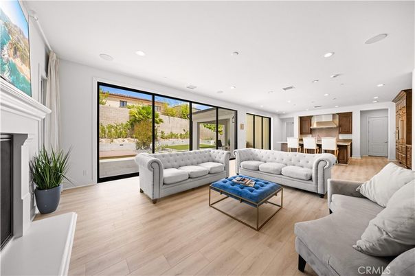 Fireplace, Interior, Kitchen, Living room, Recessed Lighting, Wood Texture Flooring