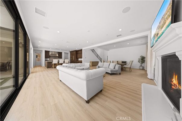 Fireplace, Interior, Kitchen, Living room, Recessed Lighting, Wood Texture Flooring