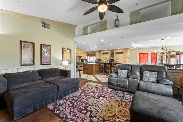 Chandelier, Interior, Kitchen, Living room, Recessed Lighting, Stainless Steel Appliances, Wood Texture Flooring