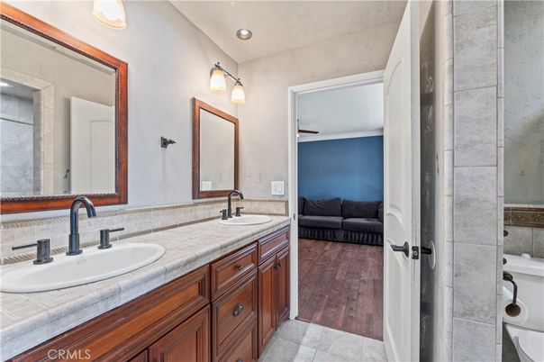Bathroom, Bedroom, Dual Sink Vanities, Interior, Recessed Lighting, Tile Countertops, Wood Texture Flooring