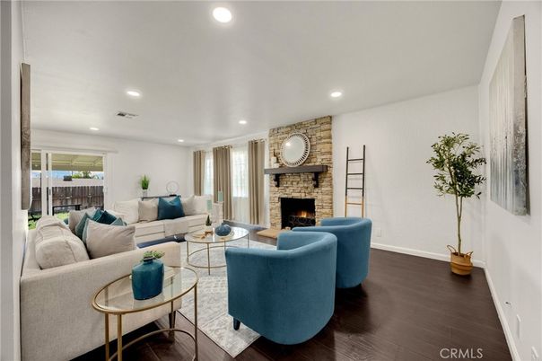 Fireplace, Interior, Living room, Recessed Lighting, Stone Walls, Wood Texture Flooring