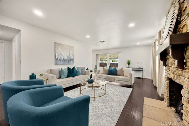 Fireplace, Interior, Living room, Recessed Lighting, Stone Walls, Wood Texture Flooring