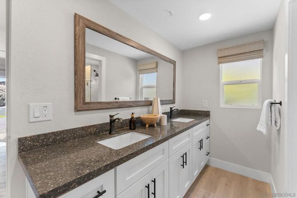 Bathroom, Dual Sink Vanities, Interior, Recessed Lighting, Wood Texture Flooring