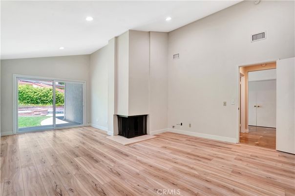 Empty room, Fireplace, Interior, Recessed Lighting, Wood Texture Flooring