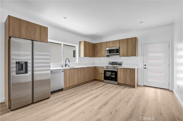 Interior, Kitchen, Recessed Lighting, Stainless Steel Appliances, Wood Texture Flooring